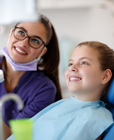 Young dental patient in treatment chair for children's dentistry